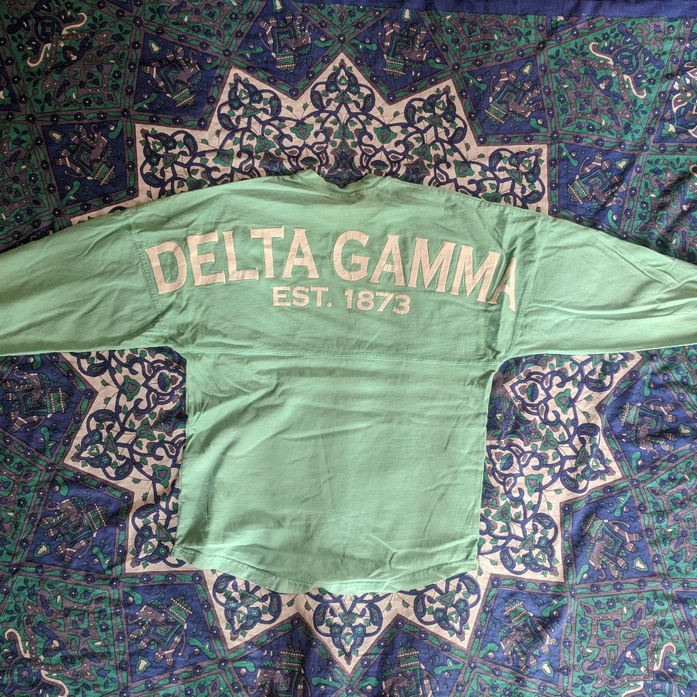 XS mint colored Delta Gamma shirt